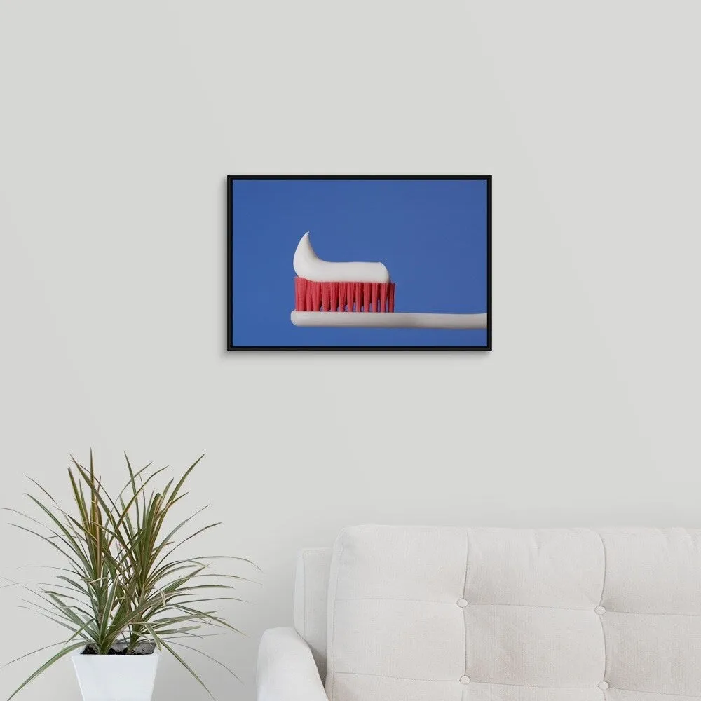 "Close-up of toothpaste on a toothbrush" Black Float Frame Canvas Art - Multi